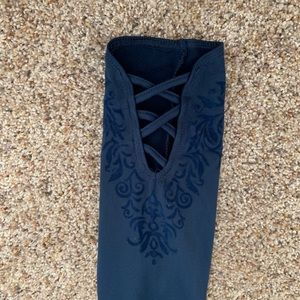 navy blue leggings w/ embellishments on leg